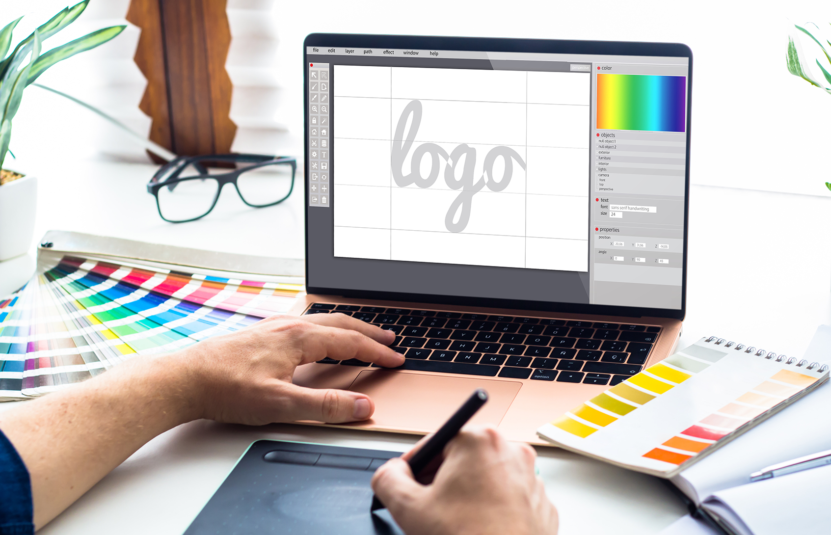 graphic-design-desktop-with-laptop-tools.png